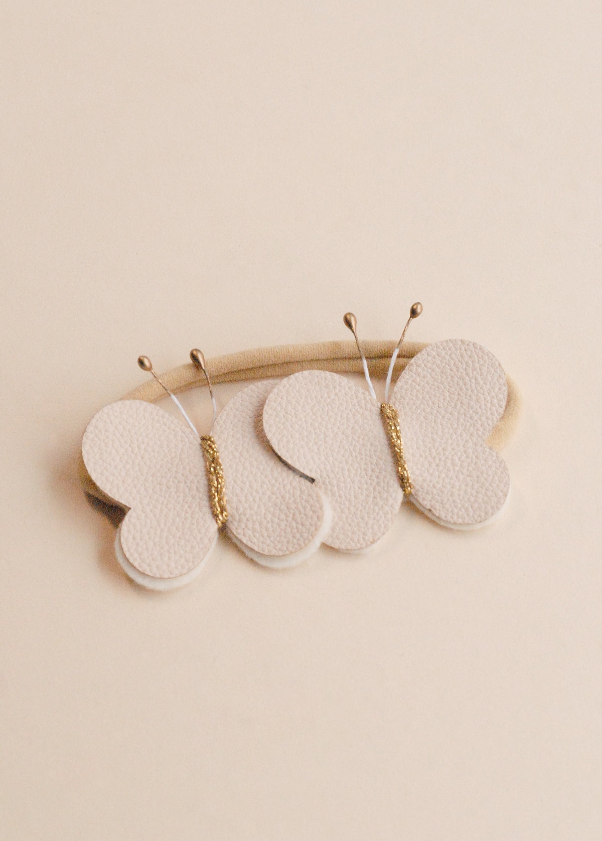 Caucho Mariposa X2 - Minibhu